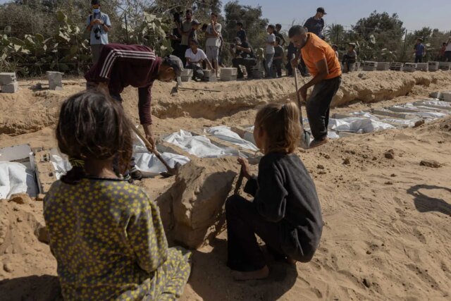 22Gaza-funeral-02-tqbg-threeByTwoMediumAt2X.jpg