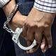 IMG_vbk-HANDCUFF-arrest_2_1_46C98QUC.jpg