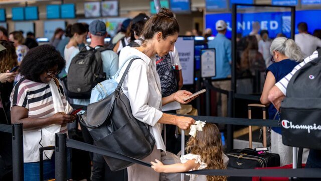 austin-airport-airline-passenger-on-phone.jpg