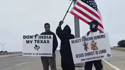 three-texas-men-waved-two-anti-hindu-placards-from-behind-their-masks-and-called-it-a-protest.jpg