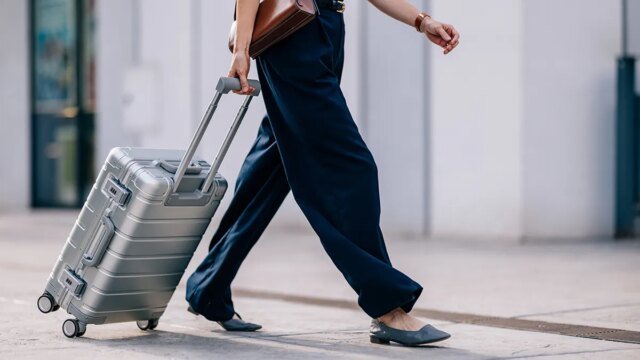woman-with-suitcase-travelling.jpg