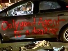 Ameaça anti-ICE pintada com spray em veículo que se acredita ter sido usado por oficiais federais durante os distúrbios em Minneapolis